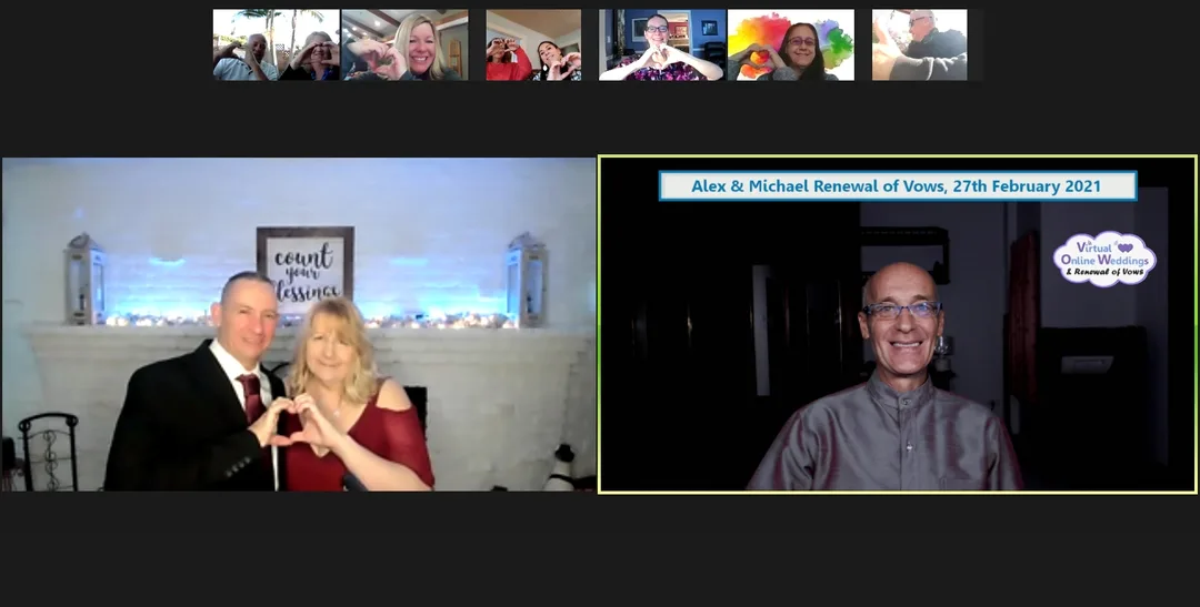 Virtual Celebrant performing online Renewal of Vows ceremony for late middle aged couple on their sofa in room, with Colorado mountains background photo.