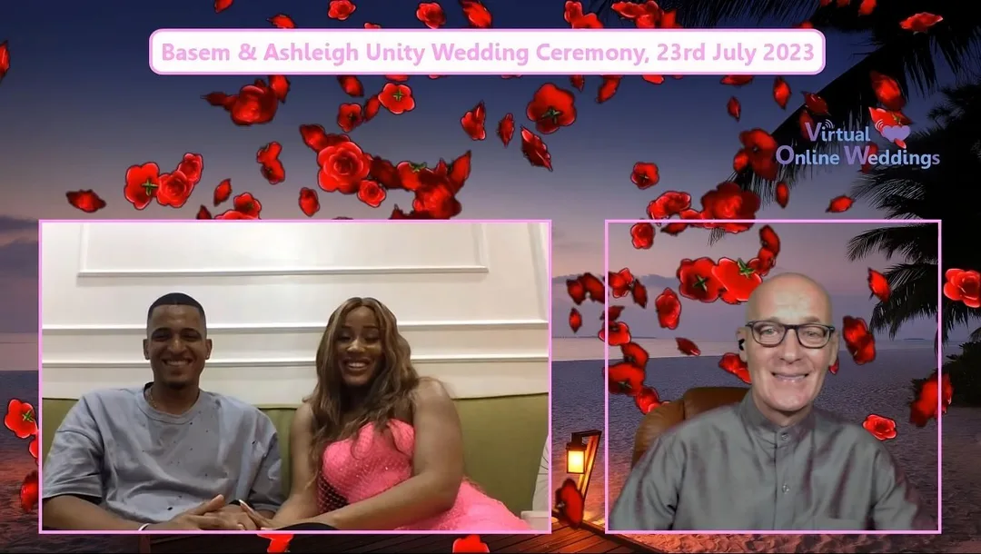 Handsome black USA couple in separate locations but next to each other in video boxes during a Virtual Online Unity Wedding. The Virtual Minister is next to them with the Eiffel Tower, river and green foliage in the virtual scene.during aPicture